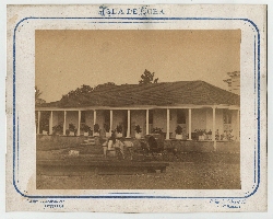 Photo of Cuba, ca. 1878: unidentified plantation residence with seated group on side veranda and volanta (carriage) and calesero (carriage driver)